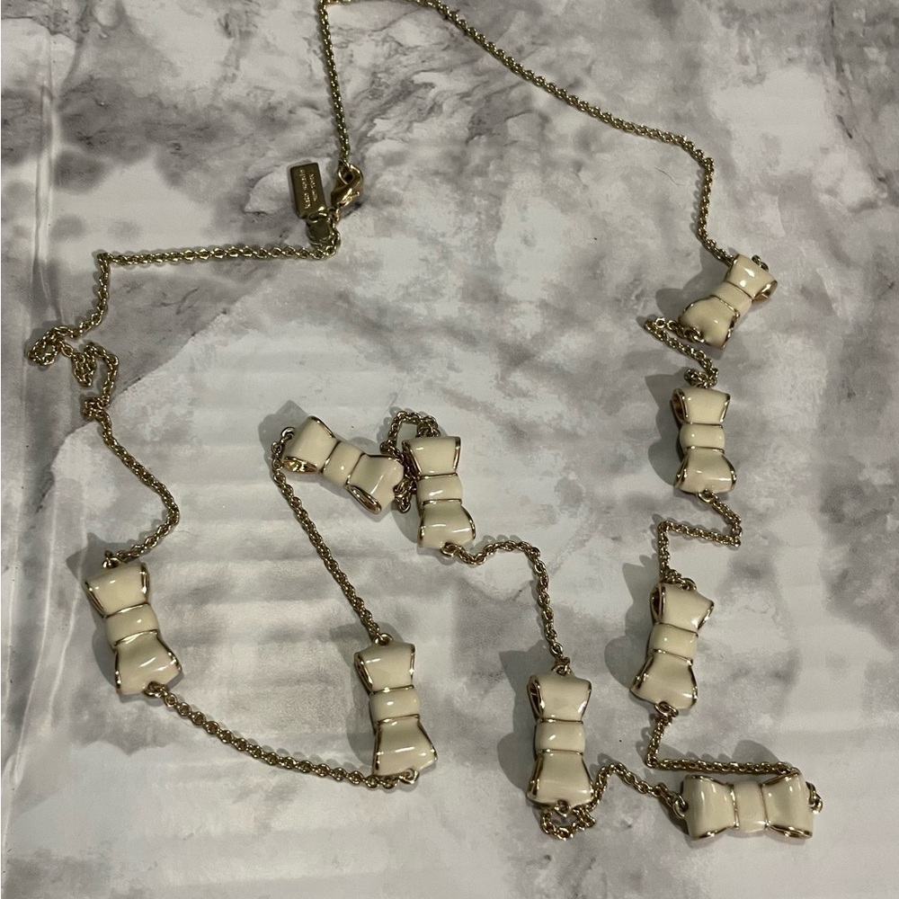Kate Spade TAKE A BOW Elegant Gold and Cream Necklace